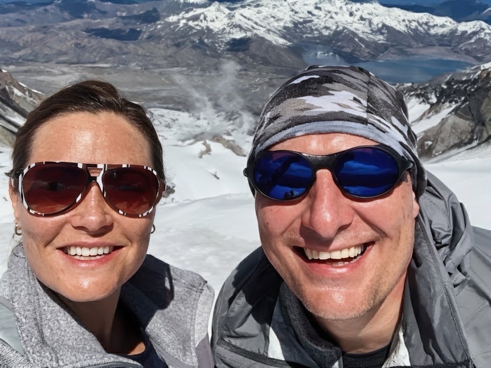 Jason Fox and his wife at a mountain summit