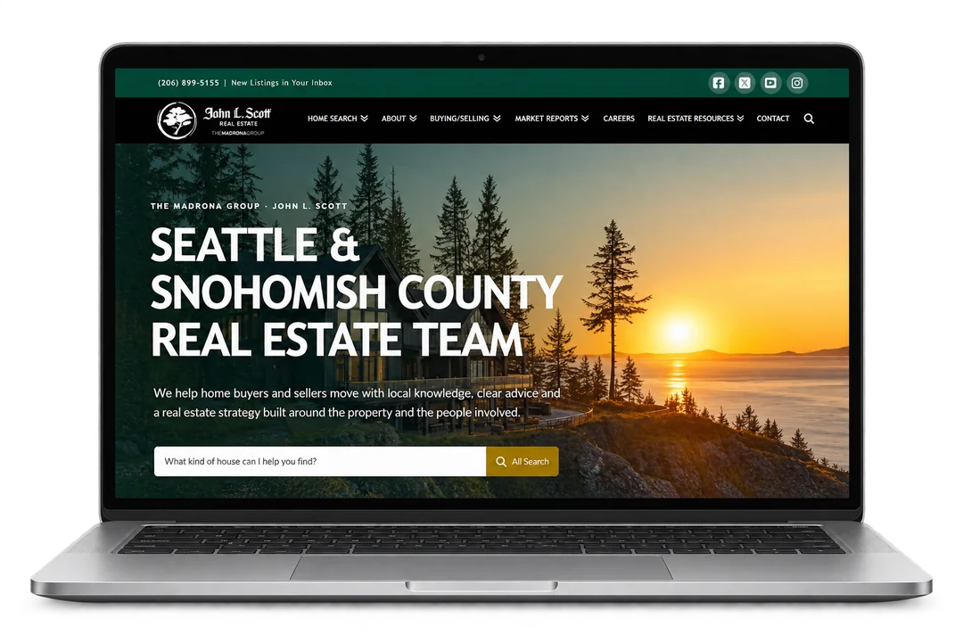 The Madrona Group real estate website displayed on a laptop